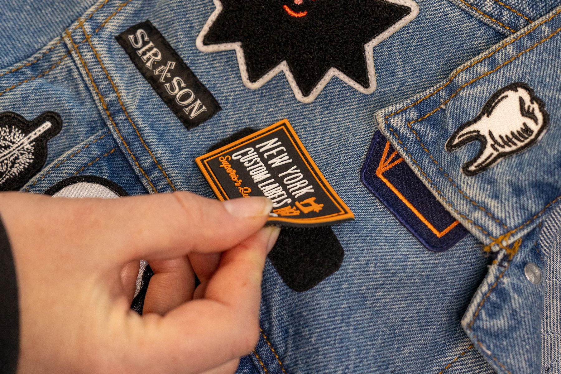 Velcro patch backing detail showing hook and loop fastener system for removable patch attachment