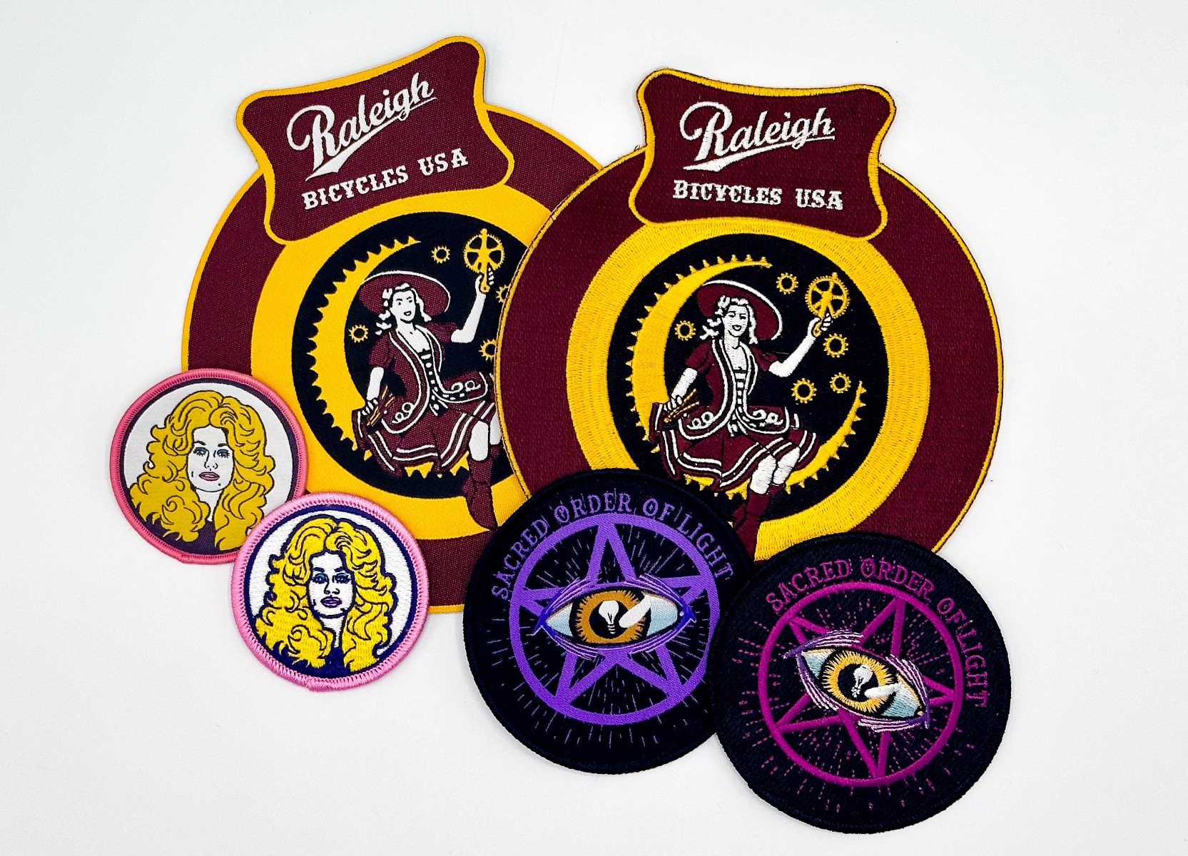 Side-by-side comparison of embroidered patch texture versus woven patch detail showing construction differences