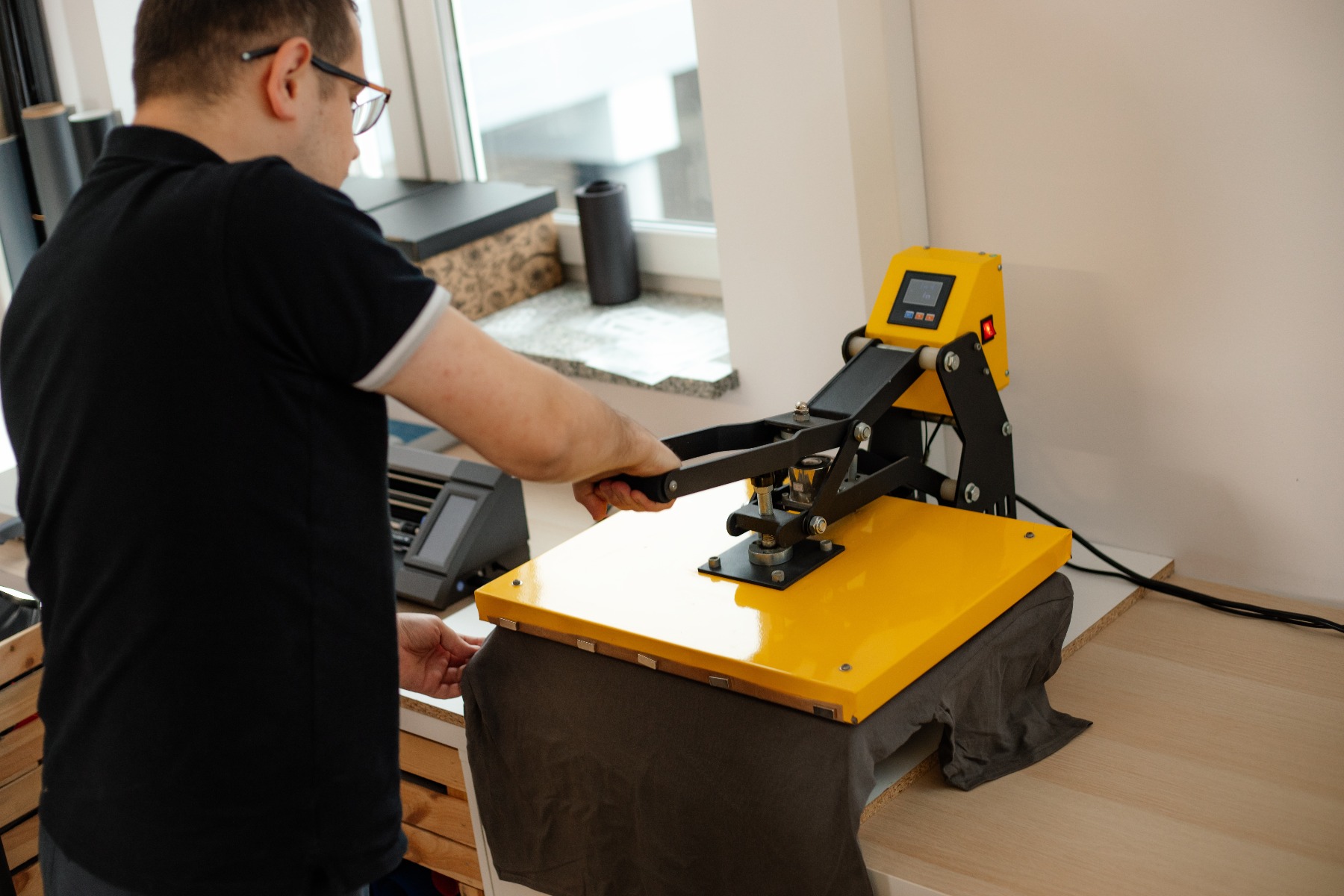 Iron-on patch application process showing heat transfer method for permanent patch attachment