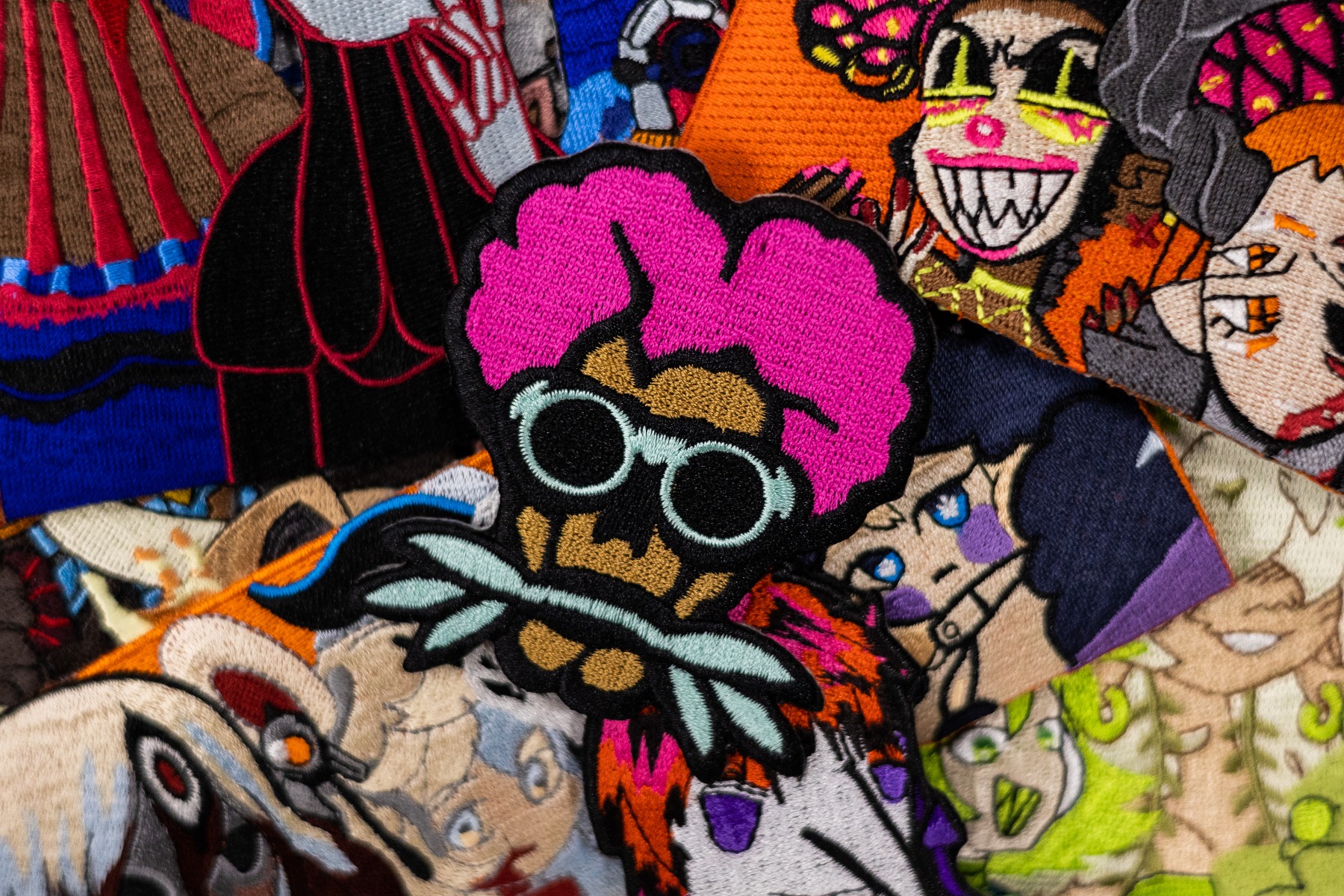 Embroidered patch collage showing texture and color